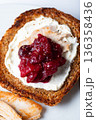 Open sandwich from leftover turkey and cranberry sauce 136358436