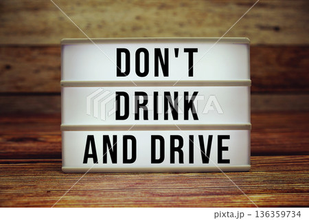 Lightbox with text "Don't Drink And Drive" on wooden background Lightbox with text "Don't Drink And Drive" on wooden background 136359734