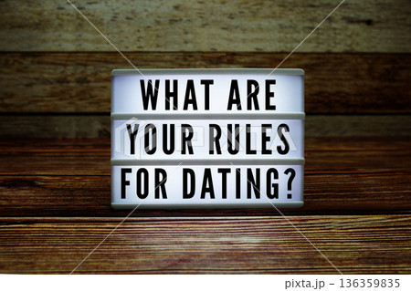 Lightbox with text "What Are Your Rules For Dating?" on wooden background Lightbox with text "What Are Your Rules For Dating?" on wooden background 136359835