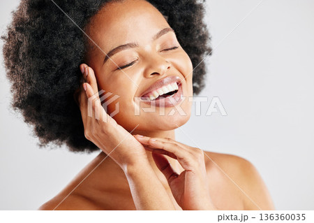 Beauty, skin care and a happy black woman with dermatology, cosmetics or natural makeup. Face of African female model in studio for facial glow, self love and soft touch on a white background Beauty, skin care and a happy black woman with dermatology, cosmetics or natural makeup. Face of African female model in studio for facial glow, self love and soft touch on a white background 136360035