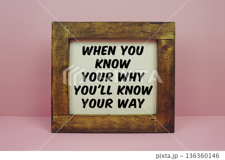 When You Know Your Why You'll Know Your Way text with brown wooden frame on pink background 136360146