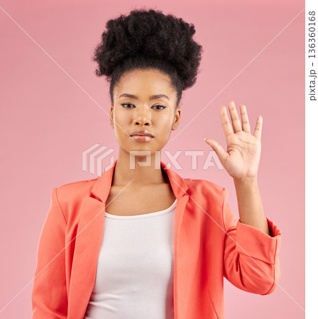 African woman, hand and stop in portrait, studio or opinion for protest, vote or icon by pink background. Girl, open palm and sign language with voice, emoji and afro with review, feedback or warning 136360168