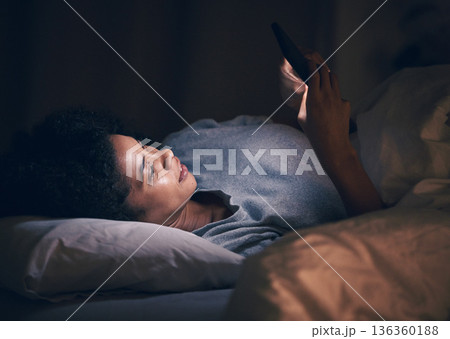 App, night and phone with woman in bedroom for social media, insomnia and networking. Communication, contact and internet with female person relax in bed at home for mobile, online and technology 136360188