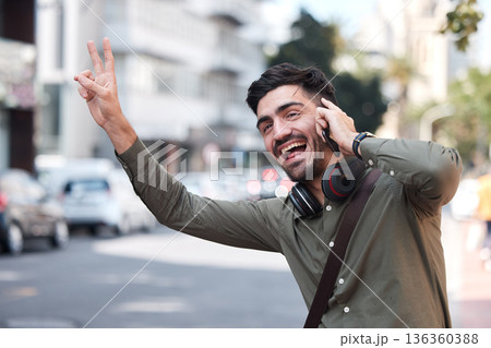 Man, phone call and wave for taxi, city and smile for peace sign language, emoji or funny face on sidewalk. Young entrepreneur, smartphone and street to stop bus, transportation and driver for travel 136360388