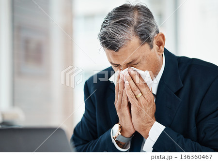 Sick, mature man and blowing nose in office with allergy, covid or virus in business company. Tissue paper, professional or manager with allergies for health problem, cold fever or bacteria in winter Sick, mature man and blowing nose in office with allergy, covid or virus in business company. Tissue paper, professional or manager with allergies for health problem, cold fever or bacteria in winter 136360467