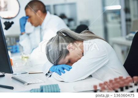 Science, sleeping woman and lab scientist with burnout, mental health anxiety or depression, medical crisis or fatigue. Laboratory, exhausted and person tired after mistake, overtime work or tension Science, sleeping woman and lab scientist with burnout, mental health anxiety or depression, medical crisis or fatigue. Laboratory, exhausted and person tired after mistake, overtime work or tension 136360475