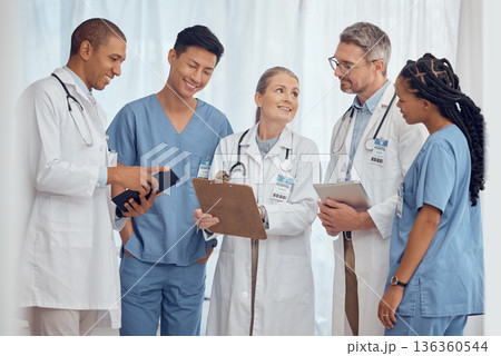 Group of happy doctors, nurses and checklist in hospital, meeting and planning surgery or team schedule. Healthcare, discussion and medical staff with smile, feedback and talking together in clinic. Group of happy doctors, nurses and checklist in hospital, meeting and planning surgery or team schedule. Healthcare, discussion and medical staff with smile, feedback and talking together in clinic. 136360544