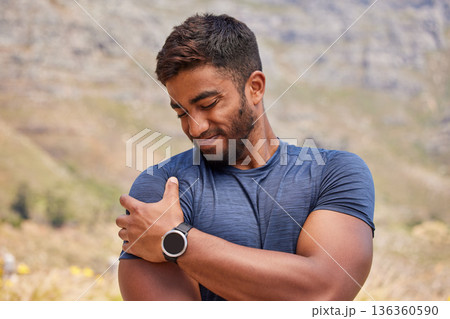 Sports man, runner and shoulder pain from fitness training injury or running workout accident outdoor. Indian person, arm muscle or closeup of injured male athlete with exercise emergency in nature Sports man, runner and shoulder pain from fitness training injury or running workout accident outdoor. Indian person, arm muscle or closeup of injured male athlete with exercise emergency in nature 136360590