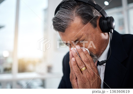 Sick, man and blowing nose in call center office for flu, allergies, and health risk in telemarketing agency. Face of mature salesman, CRM agent and tissue for virus, allergy bacteria and sneeze Sick, man and blowing nose in call center office for flu, allergies, and health risk in telemarketing agency. Face of mature salesman, CRM agent and tissue for virus, allergy bacteria and sneeze 136360619