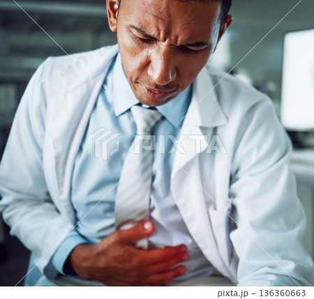 Scientist man, lab and stomach ache with health, stress or anxiety in night for pain, gas or red glow overlay. Science worker, constipation or digestion problem with hand on abdomen in laboratory 136360663