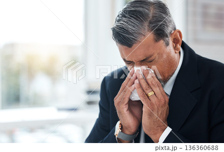 Sick business man, tissue and blowing nose for allergies, cold and virus in law firm. Face of mature lawyer sneeze with influenza, allergy bacteria and risk of health problem, sinusitis and infection Sick business man, tissue and blowing nose for allergies, cold and virus in law firm. Face of mature lawyer sneeze with influenza, allergy bacteria and risk of health problem, sinusitis and infection 136360688