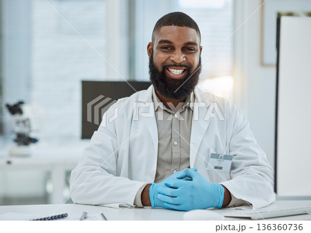 Black man, portrait and scientist smile in lab for future innovation, medical research and physics investigation. Happy male laboratory worker, science expert and pharmaceutical development at desk Black man, portrait and scientist smile in lab for future innovation, medical research and physics investigation. Happy male laboratory worker, science expert and pharmaceutical development at desk 136360736