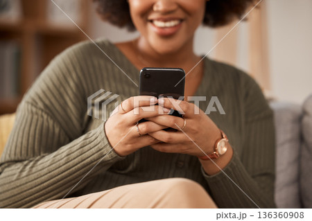 Hands, woman and typing with phone in home for social media post, online chat and reading notification. Closeup of female person relax with smartphone, download mobile games or search digital network Hands, woman and typing with phone in home for social media post, online chat and reading notification. Closeup of female person relax with smartphone, download mobile games or search digital network 136360908
