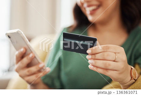 Phone, credit card closeup and woman hands with online shopping and banking at home. Ecommerce, mobile cashback and sale with digital payment and easy pay with discount and smile from web checkout Phone, credit card closeup and woman hands with online shopping and banking at home. Ecommerce, mobile cashback and sale with digital payment and easy pay with discount and smile from web checkout 136361071