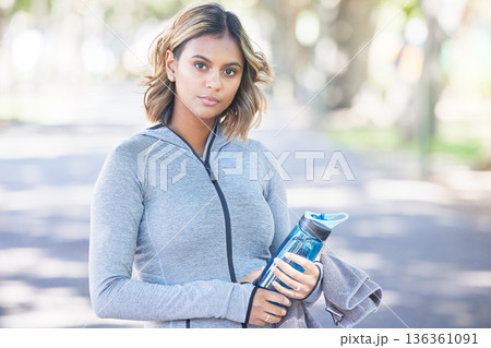Portrait, fitness and woman outdoor, exercise and water bottle with wellness, healthy and sports. Face, person and athlete outside, street or hydration with training, workout goals, athlete or liquid Portrait, fitness and woman outdoor, exercise and water bottle with wellness, healthy and sports. Face, person and athlete outside, street or hydration with training, workout goals, athlete or liquid 136361091