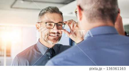 Glasses, choice and senior man, mirror and vision with eyewear in clinic, prescription lens with designer frame. Eyesight, eye care and optometry, healthcare and male person with spectacles decision Glasses, choice and senior man, mirror and vision with eyewear in clinic, prescription lens with designer frame. Eyesight, eye care and optometry, healthcare and male person with spectacles decision 136361163