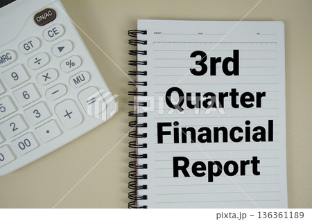 3rd Quarter Financial Report text with calculator phrase of business and financial concept 3rd Quarter Financial Report text with calculator phrase of business and financial concept 136361189