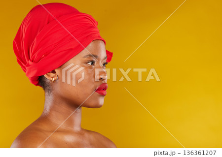 Beauty, makeup and headscarf with profile of black woman in studio for facial, creative and pride. Skincare, salon and natural with female model on brown background for wellness, self care and glow 136361207
