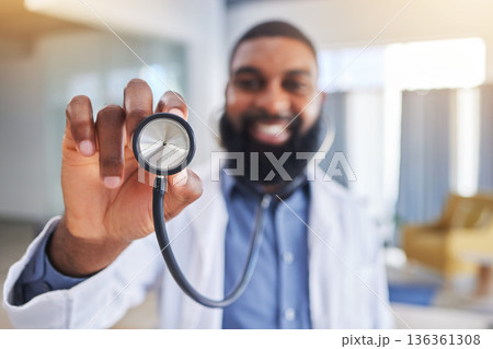 Doctor, man and hands with stethoscope for heartbeat, healthcare services and cardiology. Closeup of happy medical worker with listening tools to check heart, lungs and breathing test in hospital 136361308