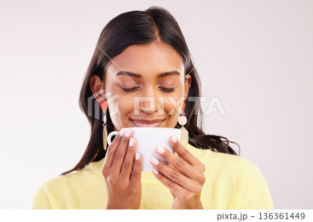 Woman, coffee and smile in studio with thinking, smell and aroma with fashion, relax or drink by white background. Gen z girl, happy student and memory with cup for coco, matcha or espresso with idea Woman, coffee and smile in studio with thinking, smell and aroma with fashion, relax or drink by white background. Gen z girl, happy student and memory with cup for coco, matcha or espresso with idea 136361449