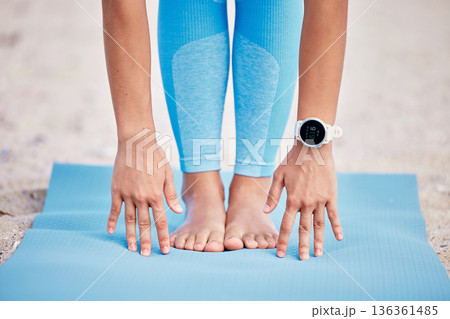 Hands, feet and yoga with a person at the beach for fitness, wellness or health outdoor in the fresh air. Exercise, nature and relax with legs stretching on a mat for pilates training or workout Hands, feet and yoga with a person at the beach for fitness, wellness or health outdoor in the fresh air. Exercise, nature and relax with legs stretching on a mat for pilates training or workout 136361485