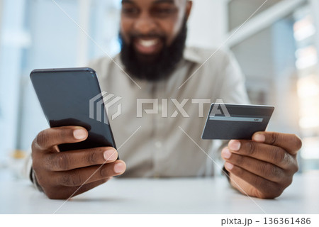 Credit card, phone and business man for online shopping, e commerce registration and fintech payment in office. Happy person with debit, financial loan and mobile banking for entrepreneur or startup 136361486