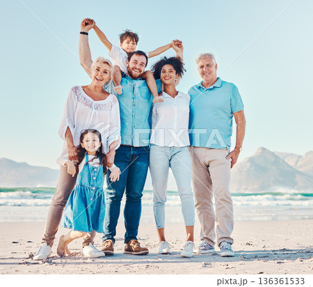 Parents, grandparents and a children at the beach for a family vacation, holiday or adventure. Portrait of multiracial men, women and young kids together outdoor for summer fun, bonding and travel Parents, grandparents and a children at the beach for a family vacation, holiday or adventure. Portrait of multiracial men, women and young kids together outdoor for summer fun, bonding and travel 136361533