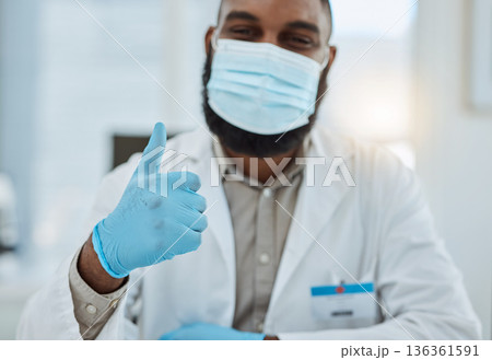 Thumbs up, doctor gloves and hands of man with support of success, trust and medical clinic. Healthcare worker show thumb sign to celebrate agreement, yes emoji and thank you for hospital consulting Thumbs up, doctor gloves and hands of man with support of success, trust and medical clinic. Healthcare worker show thumb sign to celebrate agreement, yes emoji and thank you for hospital consulting 136361591