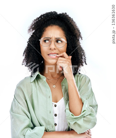 Bite finger, thinking and face of woman on a white background with worry, doubt and uncertain. Anxiety, confused and female person worried, anxious and unsure for problem, crisis and choice in studio Bite finger, thinking and face of woman on a white background with worry, doubt and uncertain. Anxiety, confused and female person worried, anxious and unsure for problem, crisis and choice in studio 136361630