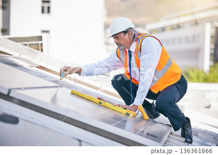 Solar panels, engineering man and tools in maintenance, energy saving builder and rooftop electrician services. Grid, screwdriver and technician or contractor person for eco photovoltaic installation 136361666