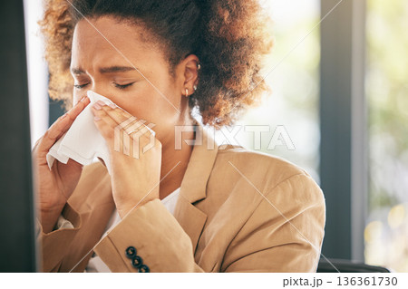 Business woman, sneeze and blowing nose with allergies, sick with virus or health issue while working at office. Corporate female, allergy and hayfever with illness, cold and flu with sinus problem 136361730