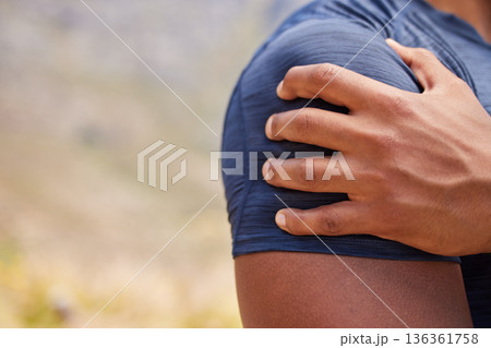 Sports man, runner and shoulder pain from workout training injury or fitness cardio running accident outdoor. Hand, arm muscle or closeup of injured male athlete with exercise emergency in nature Sports man, runner and shoulder pain from workout training injury or fitness cardio running accident outdoor. Hand, arm muscle or closeup of injured male athlete with exercise emergency in nature 136361758