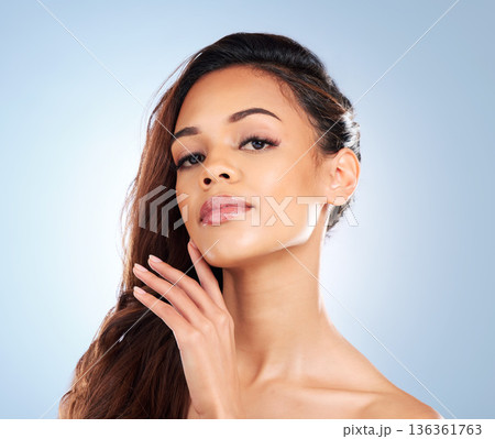 Woman, natural or portrait of hair care for beauty or skincare cosmetics in studio on blue background. Female person, hairstyle or model after facial treatment for healthy glowing skin or dermatology Woman, natural or portrait of hair care for beauty or skincare cosmetics in studio on blue background. Female person, hairstyle or model after facial treatment for healthy glowing skin or dermatology 136361763