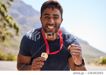 Runner, winner and portrait of happy man with medal on road for fitness goal, winning or running race. Sports champion, success or face of excited athlete with competition victory in cross country 136362083