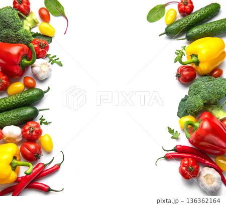 Fresh colorful vegetables creating border on white background 136362164