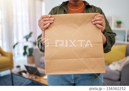 Delivery, fast food and woman with hand holding package order at home. Closeup, parcel and customer with paper bag from online shopping, ecommerce with mockup space for branding, advertising or logo Delivery, fast food and woman with hand holding package order at home. Closeup, parcel and customer with paper bag from online shopping, ecommerce with mockup space for branding, advertising or logo 136362252
