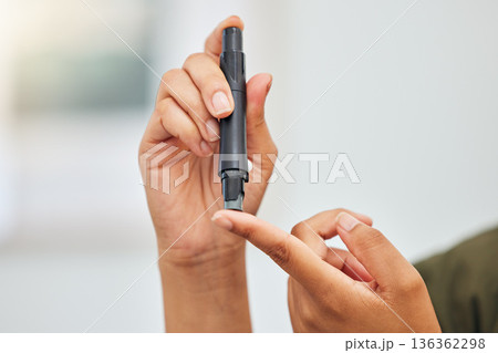Woman, hands and blood sugar test of diabetes, healthcare analysis or medical glucometer results. Closeup of person poke finger with needle to check insulin risk, monitor glucose or diabetic medicine 136362298