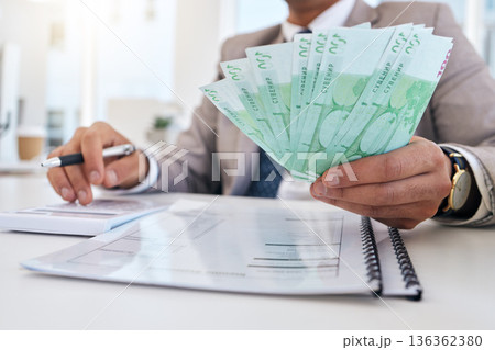 Businessman, money and documents with calculator for accounting, budget planning or finance on office desk. Closeup of man or accountant hands with cash for savings, audit or salary at the workplace 136362380