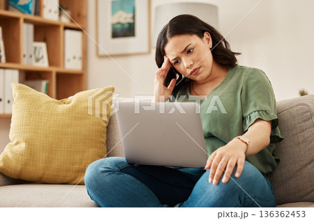 Remote work, stress and woman with laptop, headache and burnout on sofa, frustrated and annoyed at home. Freelance, glitch and lady online with anxiety from 404, internet or tax crisis in living room Remote work, stress and woman with laptop, headache and burnout on sofa, frustrated and annoyed at home. Freelance, glitch and lady online with anxiety from 404, internet or tax crisis in living room 136362453