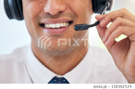 Happy man, smile and headphones with mic in call center for customer service, support or telemarketing at office. Closeup of male person, consultant or agent mouth for friendly online advice or help 136362524