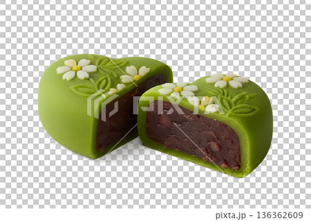 Heart-shaped green mochi filled with red bean paste, decorated with a delicate floral petal, perfect for japanese sweets and valentine's day 136362609