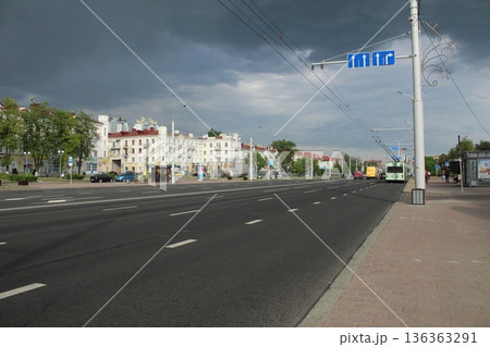 The road between houses in bad weather A cloudy day in the city The road between houses in bad weather A cloudy day in the city 136363291