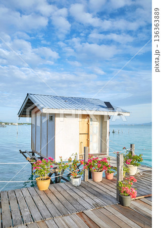 Cabin on a wooden platform over water, Semporna district, Borneo, Malaysia. 136363889