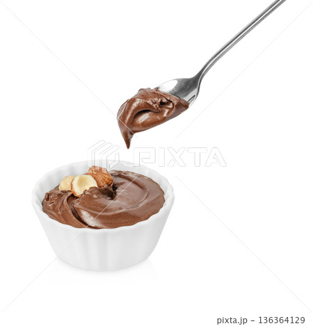 Chocolate hazelnut spread in bowl with spoon Chocolate hazelnut spread in bowl with spoon 136364129