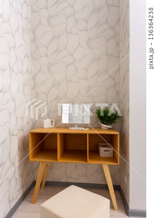 Minimal dressing room interior with open clothing rack 136364238