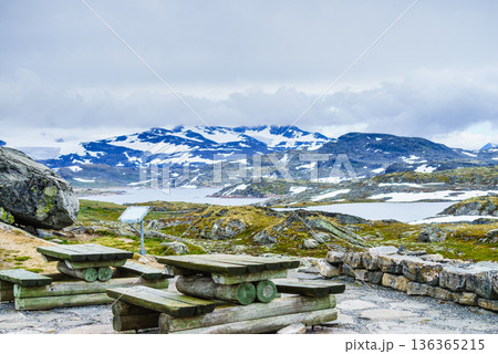 Camp site with picnic table in norwegian mountains 136365215