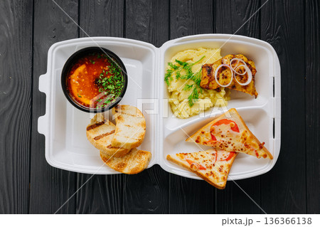 Takeout solyanka soup with mashed potatoes, chicken and cheese toast Takeout solyanka soup with mashed potatoes, chicken and cheese toast 136366138