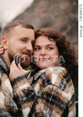 Couple enjoys a moment together in nature on Valentines Day as they celebrate their love and connection Couple enjoys a moment together in nature on Valentines Day as they celebrate their love and connection 136366275