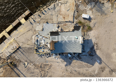 Hurricane Milton storm surge severe damage to waterfront house on Manasota Key, Florida. Destroyed home on gulf coast 136366872