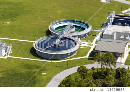 Water treatment facility with multiple tanks and filtration units. Vital infrastructure for sustainable water management and distribution 136366884